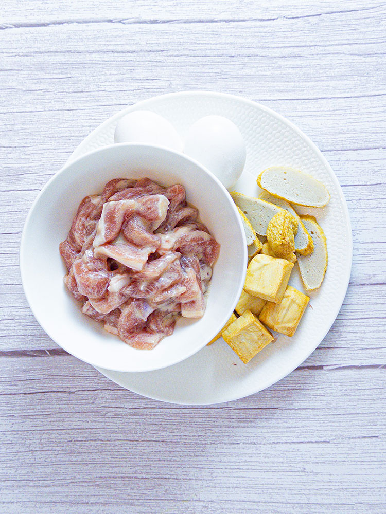 hot pot marinated pork, fish tofu, egg